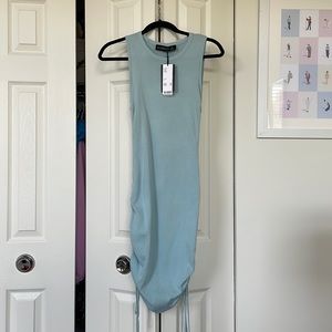 Never worn with tags, Lioness (Revolve) dress. Light blue; body con.